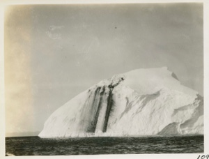 Image of Iceberg with two black marks on face
